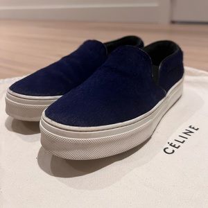 Celine Navy Calf Hair Slip Ons
Size 7